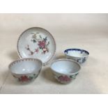 Three nineteenth century tea bowls with a saucer