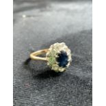 18ct gold sapphire ring set with diamonds. Size N. Total weight 4 gm