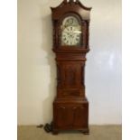 A large mahogany grandfather clock J.J.Reese Port Madoc with hand painted dial. Two weights and a