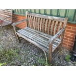 A Wooden garden bench.