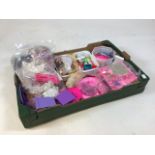 Box of assorted Barbie accessories including clothes and a dog. AF.