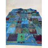 A patchwork wall hanging. W:100cm x H:150cm