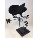 Mounted weathervane with pig silhouette direction hand. Rotating cardinal NESW points. Fair to