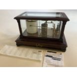 An early 20th century Short and Morgan mahogany and brass barograph with fitted drawer. Bevelled