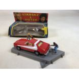 Corgi Starsky and Hutch Ford Torino with figures and dented and dusty box