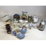 A quantity of ceramics including Wedgwood Jasperware, Beswick, Royal Doulton, Dartmouth Pottery a