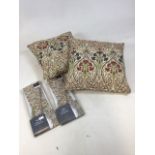 Pair of Dunelm seat cushions, in Lucetta Jewel pattern, with two packed pairs of matching curtain