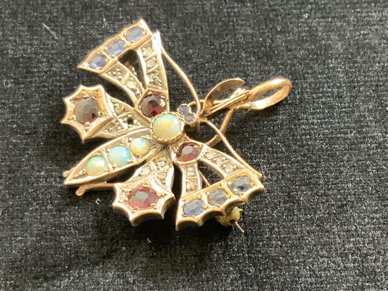 A gold 1920 30’s Butterfly brooch pendent, un-hallmarked set opals, rubies, sapphires and diamonds. - Bild 2 aus 6