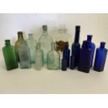 A collection of vintage apothecary bottles.