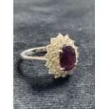 18ct white gold ruby and diamond ring. Total weight 3 gm. Ring size L. Size of ruby 8mm x 6mm