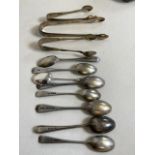 A quantity of hallmarked silver spoons and sugar nips. Total weight 177 grams.