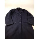 A Policemans overcoat - epaulettes numbered 3330. 44 inch x chest. Length 42 inches