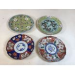 Four oriental plates possibly nineteenth and twentieth century