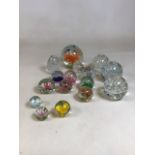 A quantity of glass and Perspex paperweights H:16cm Height of largest
