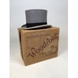 A grey Top Hat with black hat band by Woodrow of Piccadilly, London. Size 7 1/8 in original box
