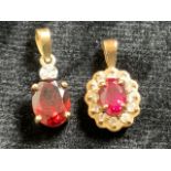 9ct gold ruby and and diamond pendant also with a garnet and diamond pendant with rubbed hall mark
