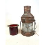 A copper and brass ships lantern- not under command, with original glass also with a red glass