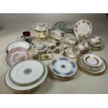 A quantity of mixed ceramics including dinner plates, platters, part tea set and other items. Plates