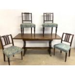 A 20th century pine topped table with four Georgian chairs. W:167cm x D:75cm x H:75cm