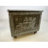 A vintage embossed Brass covered wood/coal box on castors W:48cm x D:34cm x H:43cm