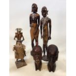 A pair of Arfrican carvings one A/F and a pair of Kenyan heads circa 1960 also with two Don