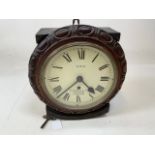 A railway style wall clock with key. Face marked GWR - R.Jones & Co makers London