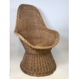 A vintage wicker arm chair H:103cm Height of back H:40cm Height of seat