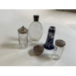 a collection of silver topped and white metal glass and ceramic items also with an engraved glass