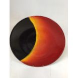 A Poole Pottery charger - the Eclipse designed by Alan Clarke. A limited edition piece W:35.5cm