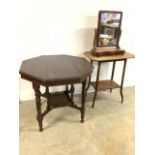 An octagonal table with under shelf with fret cut gallery also with a two tier occasional table