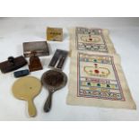 A collection of vintage items including two hand mirrors, two blotters, a Clipless Ideal paper