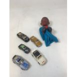 A Muhammad Ali glove puppet also with five vintage cars