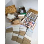 Quantity of worldwide and British stamps, with envelopes by country. Good condition.