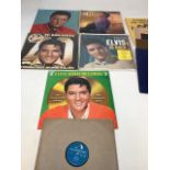 Elvis Presley. Five LPs, a damaged 78 of Hound Dog and Donâ€™t be Cruel with others by various