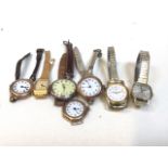 Assortment of ladies watches, 7 total. 3 similar with 375 9ct hallmarked case, one minus strap.