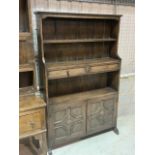 A 20th century oak wall cupboard and shelves W:107cm x D:32cm x H:162cm