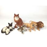 A ceramic menagerie of decorative cats, mostly Beswick, the snow tiger cub Back in the USSR. Siamese