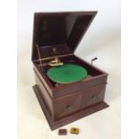 Vintage Academy gramophone, in sarcophagus case. AF, for restoration. Winding handle present. Tins