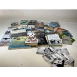 A quantity of military related books, ordnance survey maps and large quantity of photographs mixed