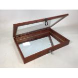 Late 20th century glazed tabletop display case. Mirrored base. Working lock with key. W:68.5cm x D:
