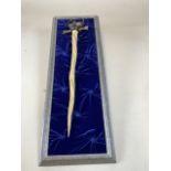 a Franklin Mint ornamental display bejewelled hilt sword on presentation board H:62cm