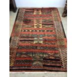 Large Eastern style lounge rug or carpet with geometric patterns. Fair to good condition, would