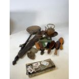 A mixed lot of metalware, brushes and cigarette cards includes scales, weights, bed pan and others