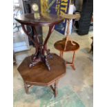 A leather topped wine table also with other ocassional tables.