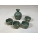 A Japanese Celadon crackled glazed rice jug and 4 bowls H:12cm Height of jug
