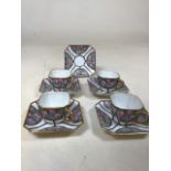 Vintage German Fraureuth coffee cups and saucers. Four with an extra saucer