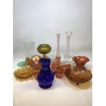 A quantity of mainly coloured glass including carnival glass, Bohemian blue jug and mid century