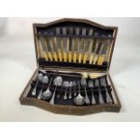 A vintage part canteen of stainless steel cutlery