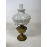 An Aladdin oil lamp with opaque moulded glass shade in art nouveau style W:29cm x H:58cm