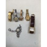 Six ladies watches including a Premex marcasite watch, a Guess, a Seiko, Curtis, JW Benson and a